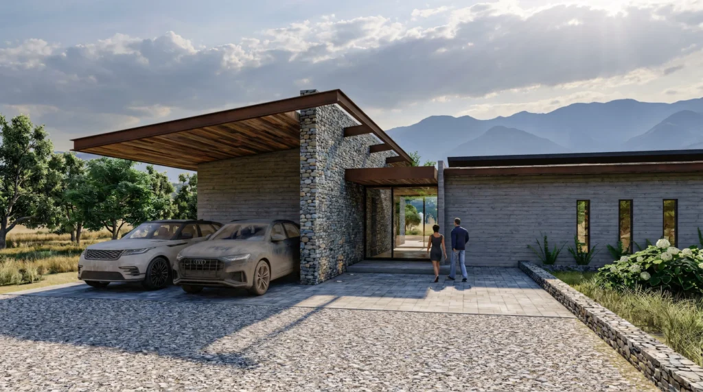 Acceso principal de vivienda en Limache con muros de piedra y pérgola